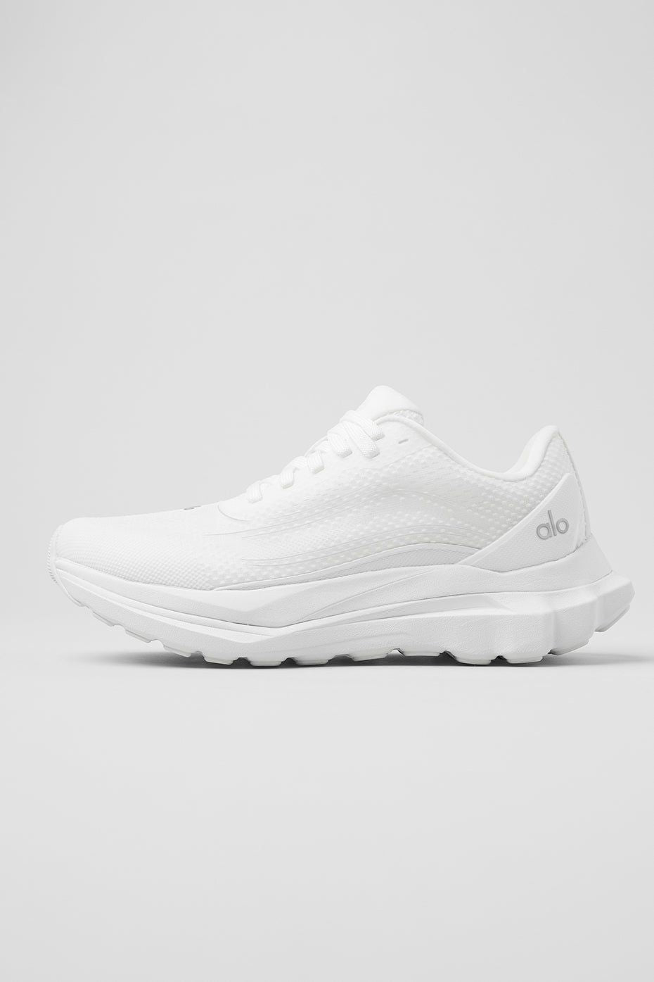 Side profile of ALO Runner all-white sneaker