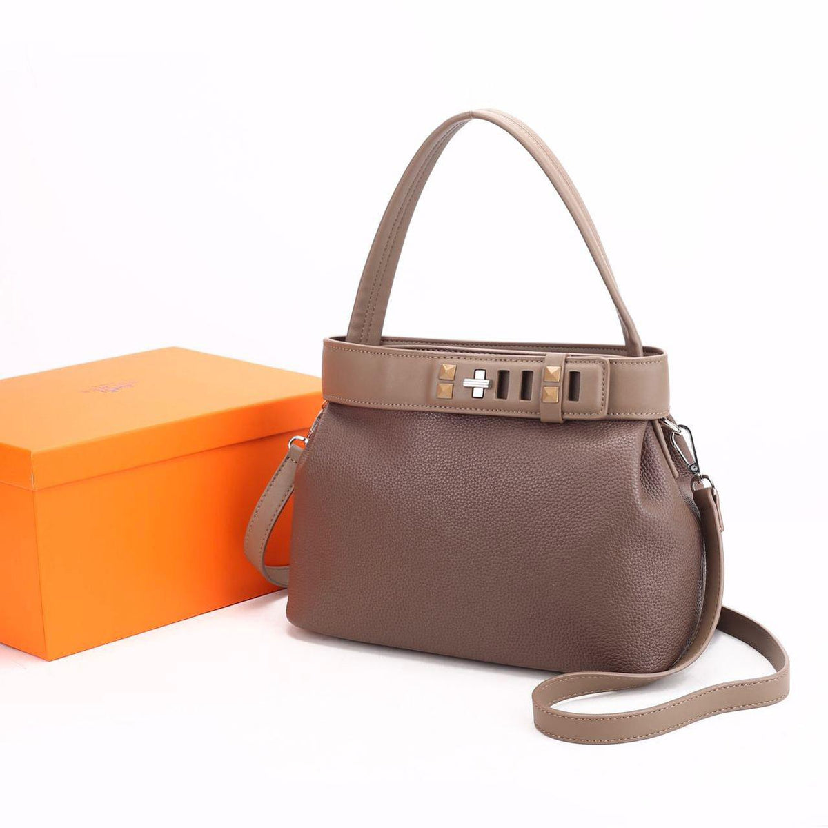 Brown Hermes style women's handbag with shoulder strap