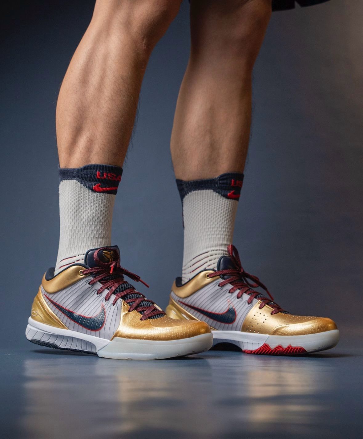 Nike Kobe 4 Protro Gold Medal unisex basketball shoes on feet