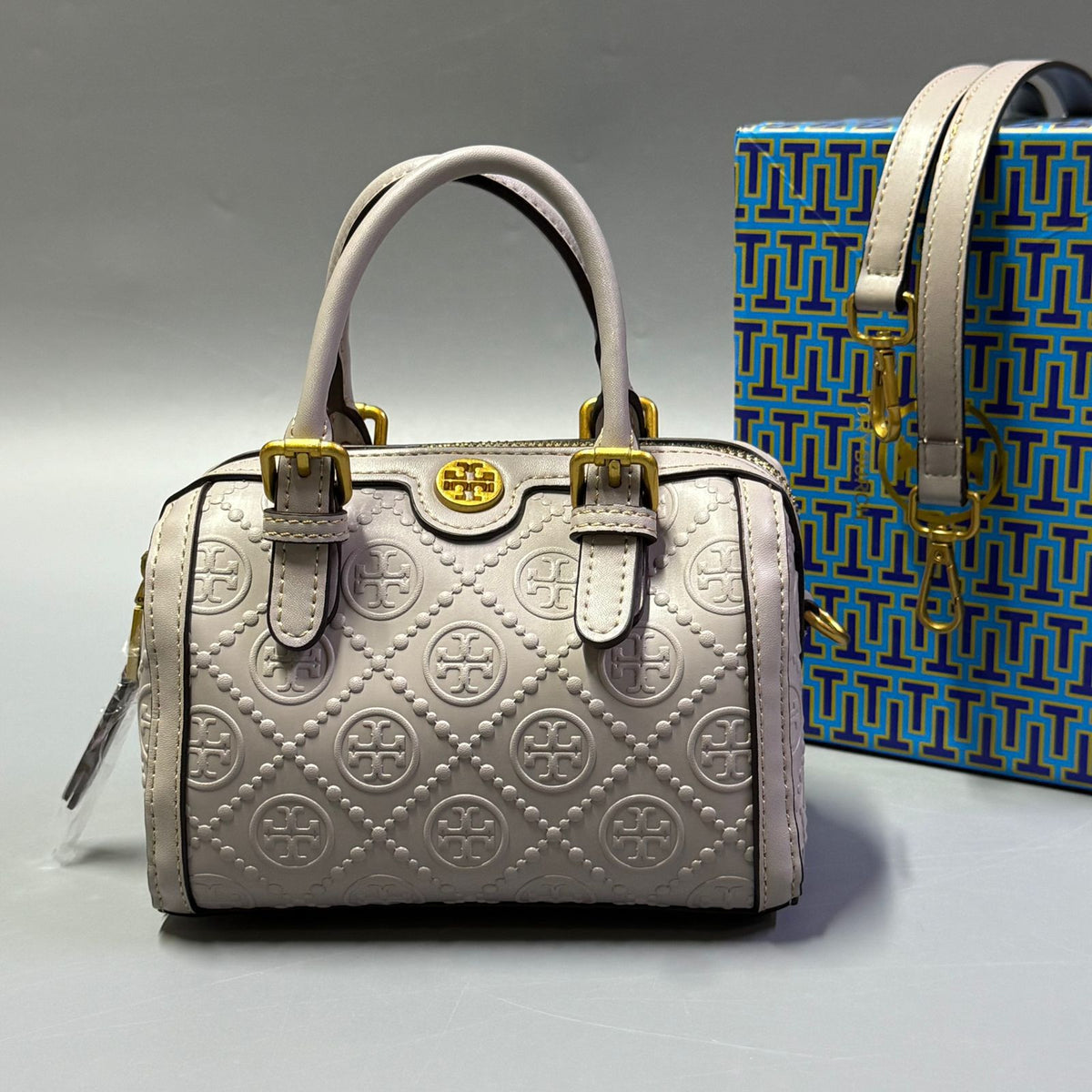 Light Gray Tory Burch style handbag with elegant gold detailing