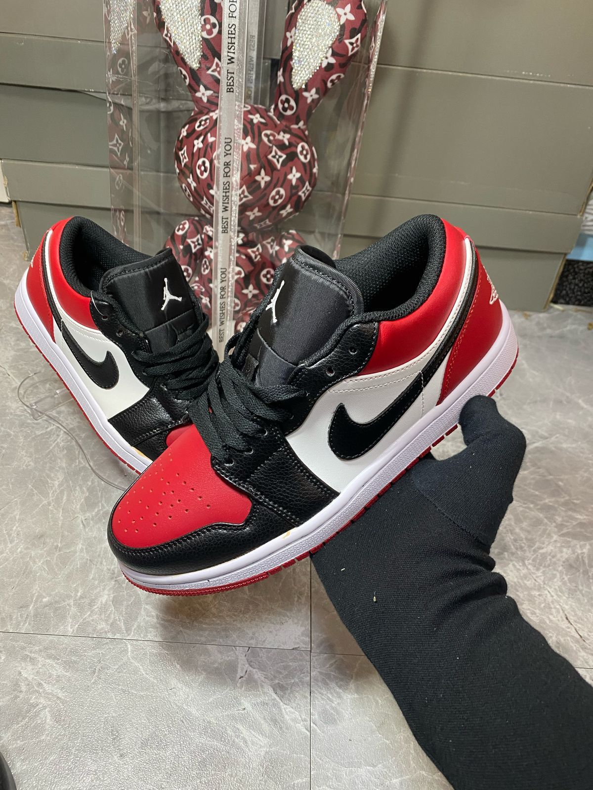 Air Jordan 1 Low Bred Toe in Gym Red, White and Black