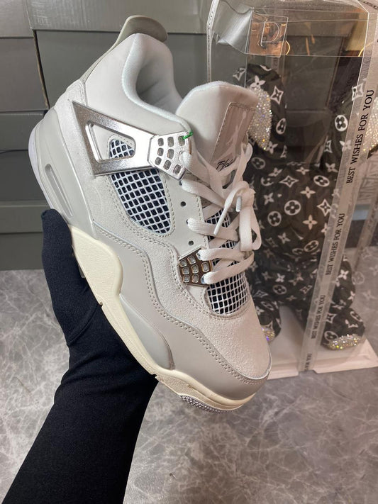 Air Jordan 4 Retro Frozen Moments women’s grey sneakers
