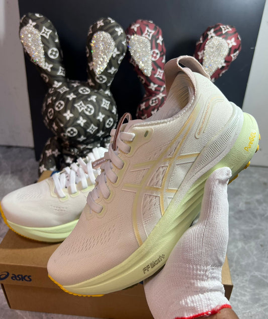 ASICS GEL-KAYANO cream and yellow sneakers at Aone Brands Dubai
