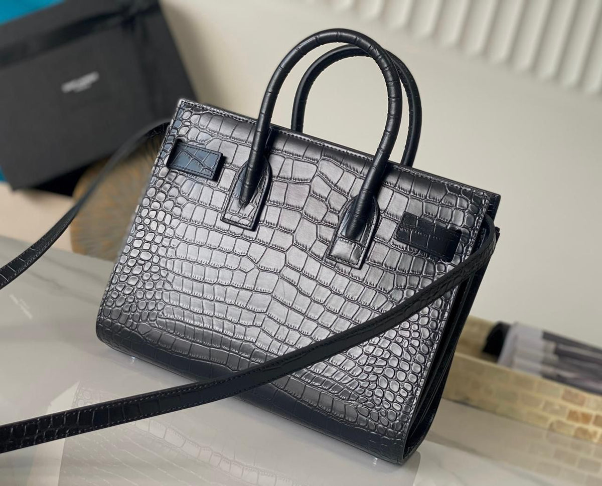 Black YSL style luxury handbag front view