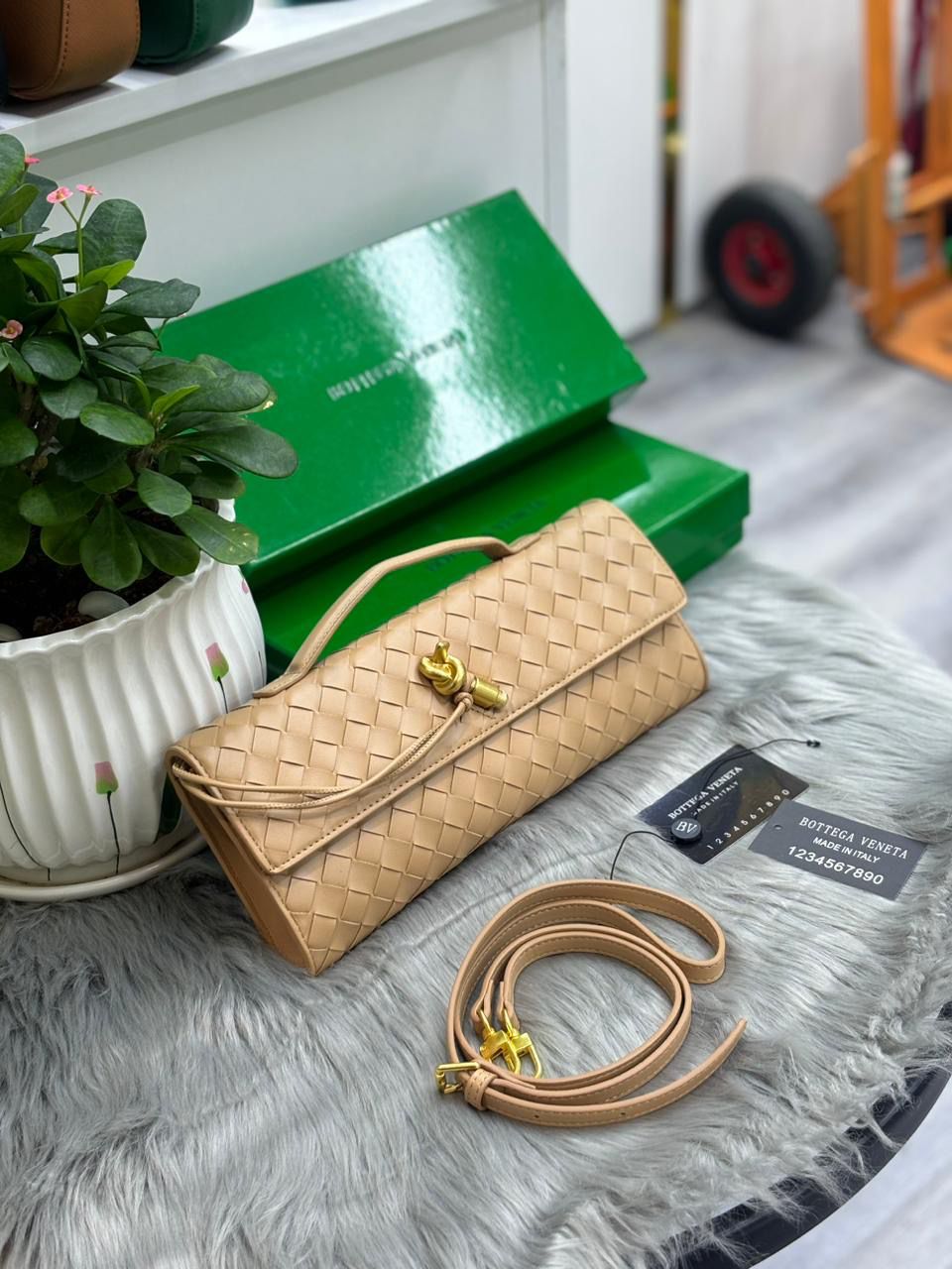 Nude beige Bottega Veneta Intrecciato woven leather clutch purse