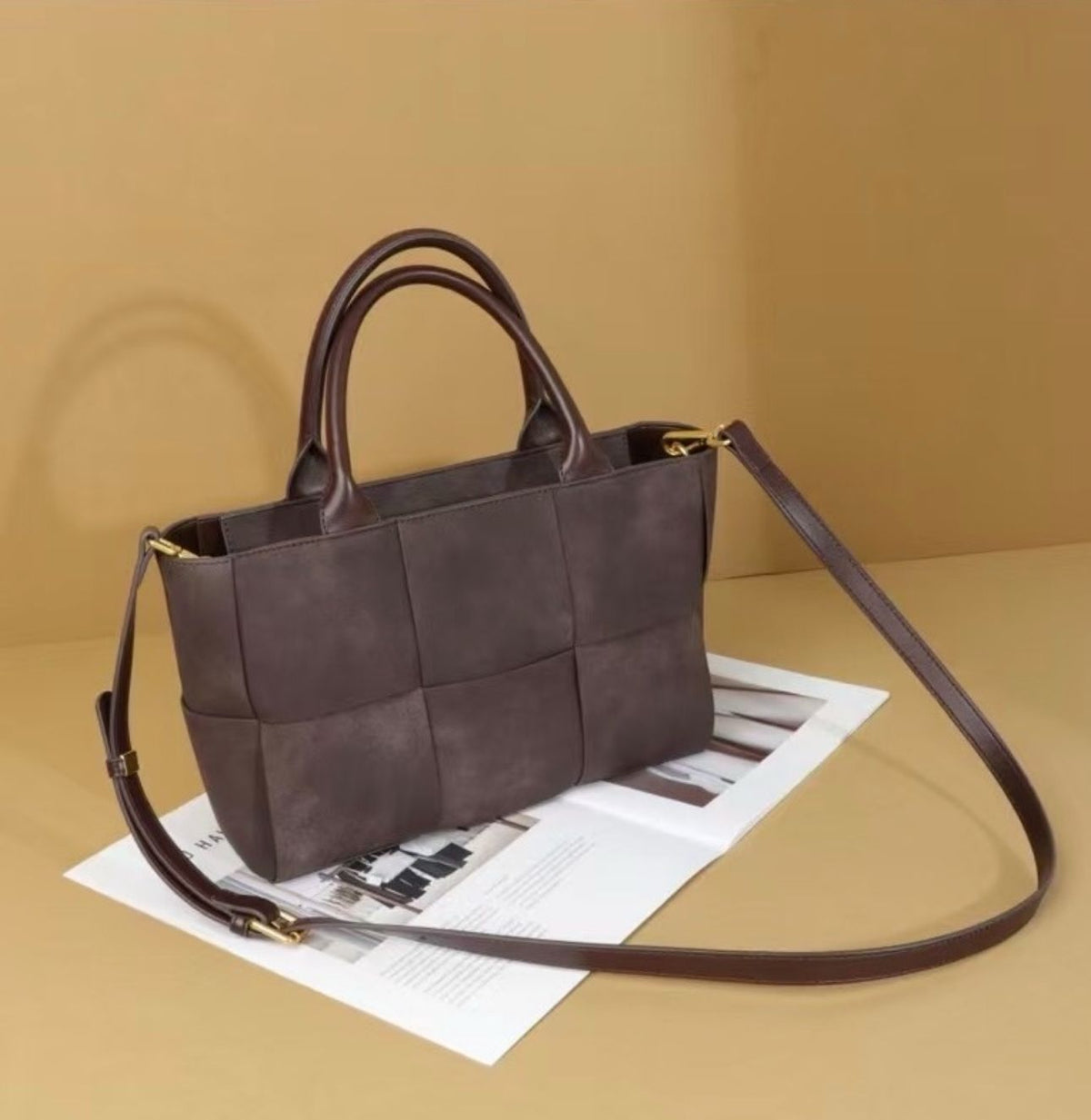 Side view of elegant Bottega style women's handbag
