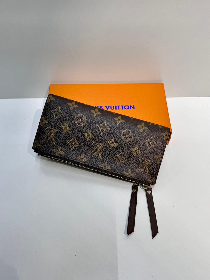 Brown monogram long wallet with black wrist straps
