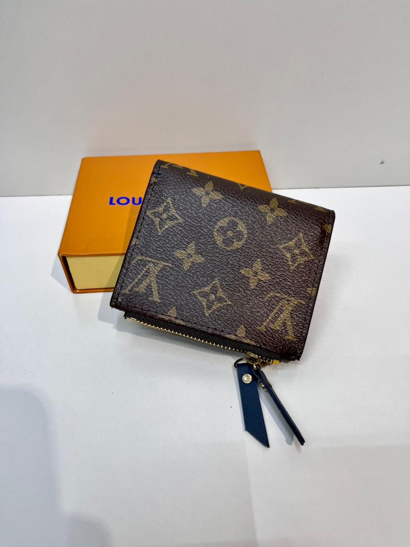 Brown monogram women’s wallet with blue wrist strap