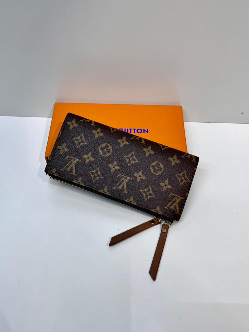 Brown monogram women’s zip wallet with gold-tone detail