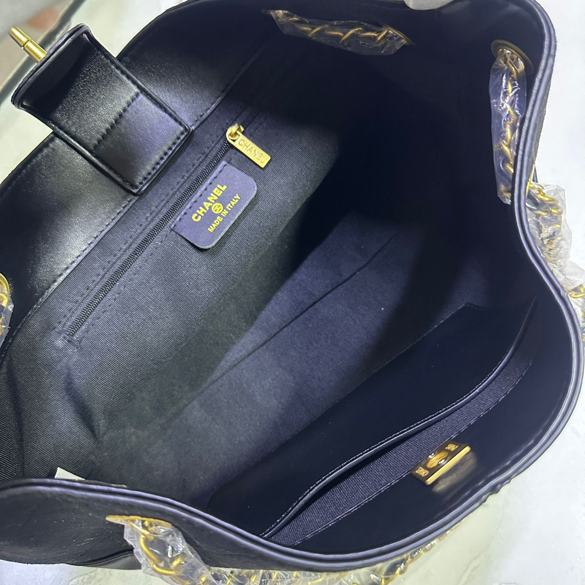 Chanel women's handbag interior compartment view