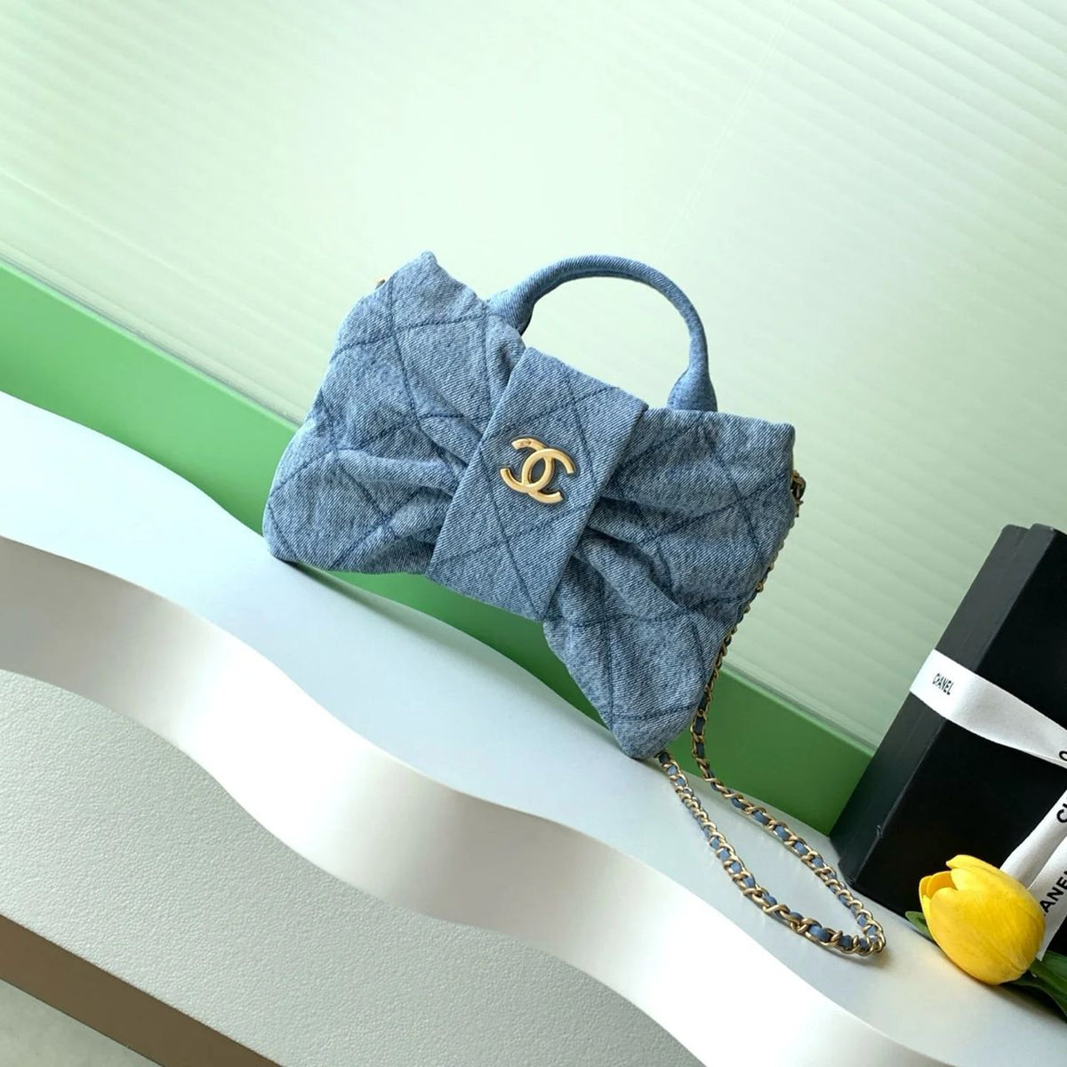 Blue Chanel women’s quilted top-handle bag