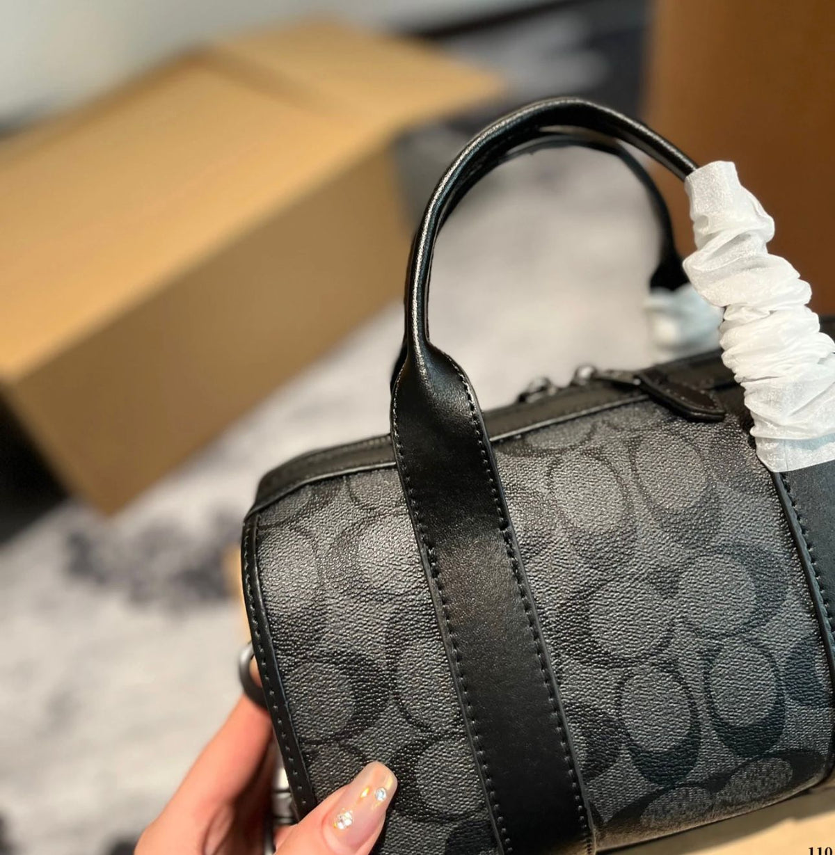 Back view of elegant black women's handbag