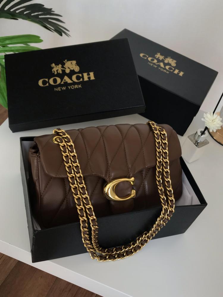 Brown Coach women’s quilted shoulder bag