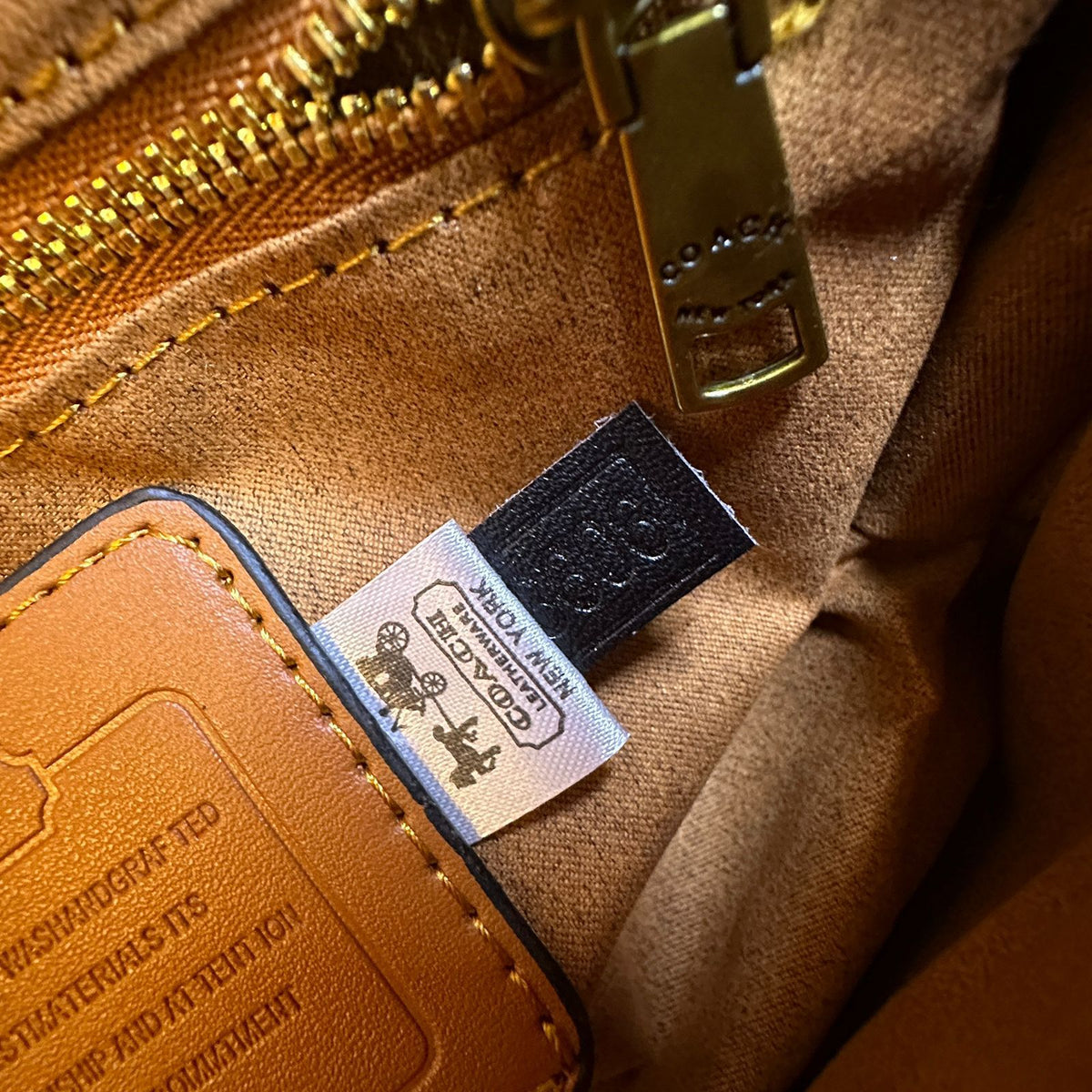 Coach inspired logo detail on women's shoulder handbag