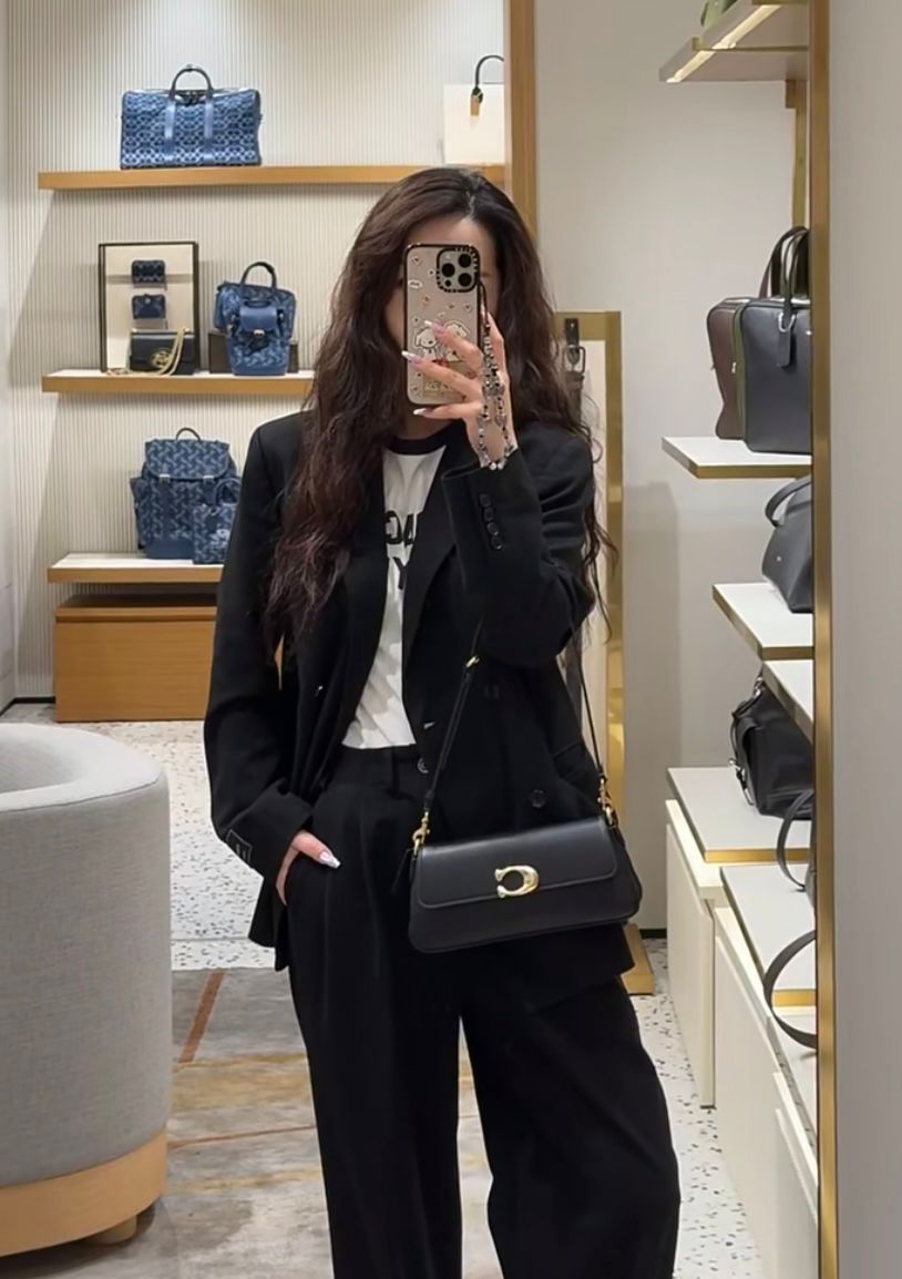 Coach women's shoulder bag styled for women at Aone Brands Dubai
