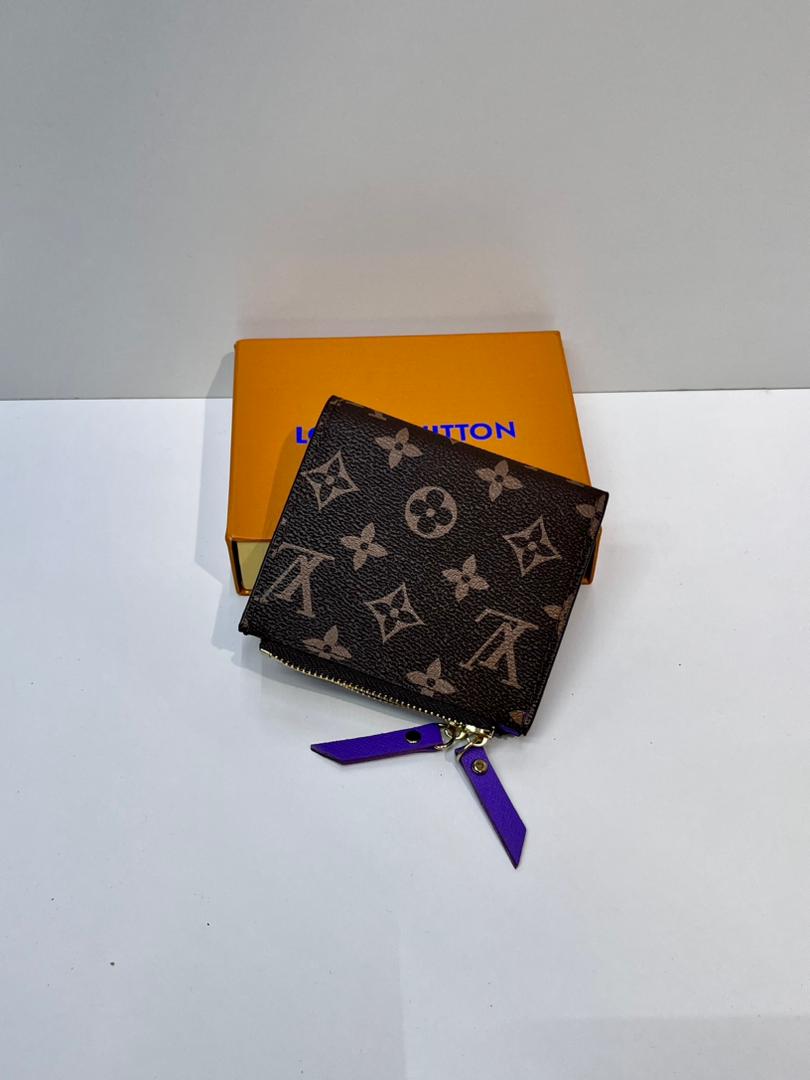 Dark-brown monogram women’s wallet with purple wrist strap