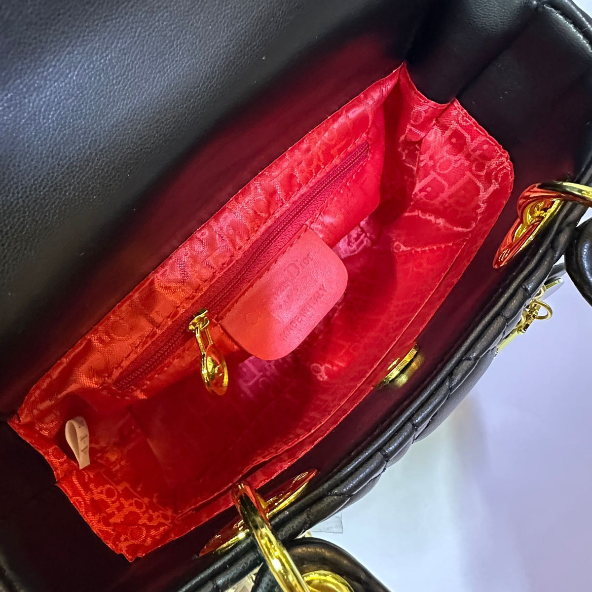 Dior style handbag interior with premium finishing detail