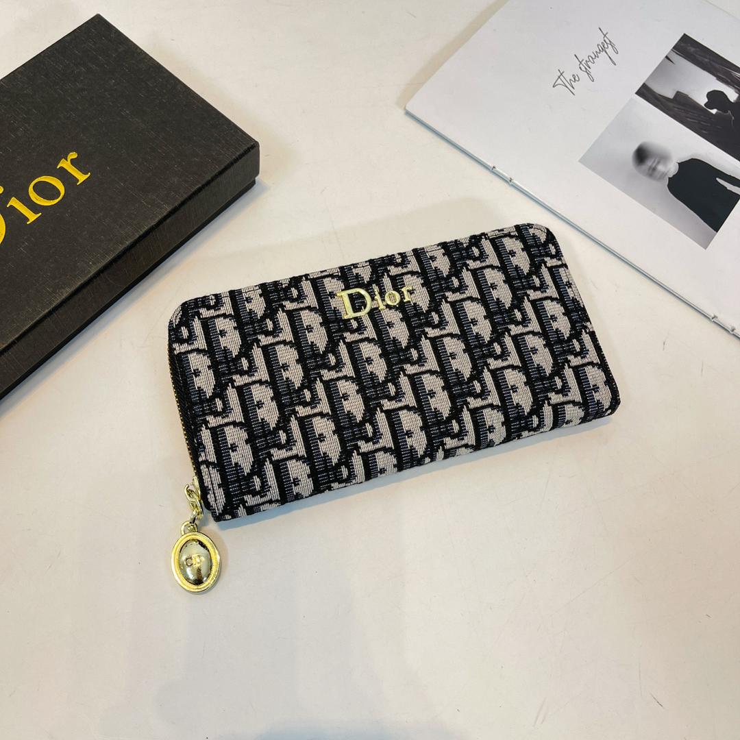 Women’s Dior wallet with diagonal patterned exterior