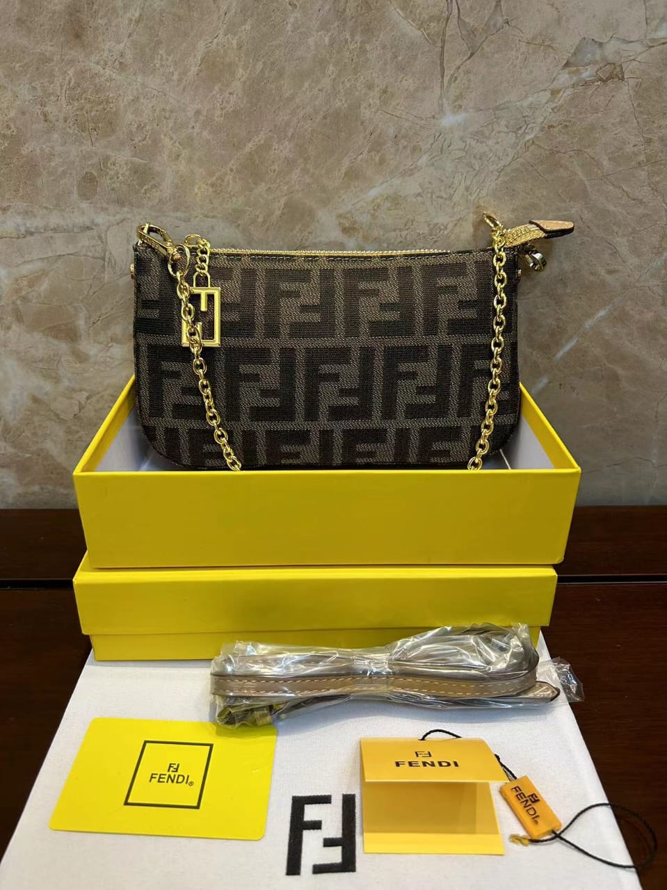 Fendi women's monogram handbag displayed with presentation packaging
