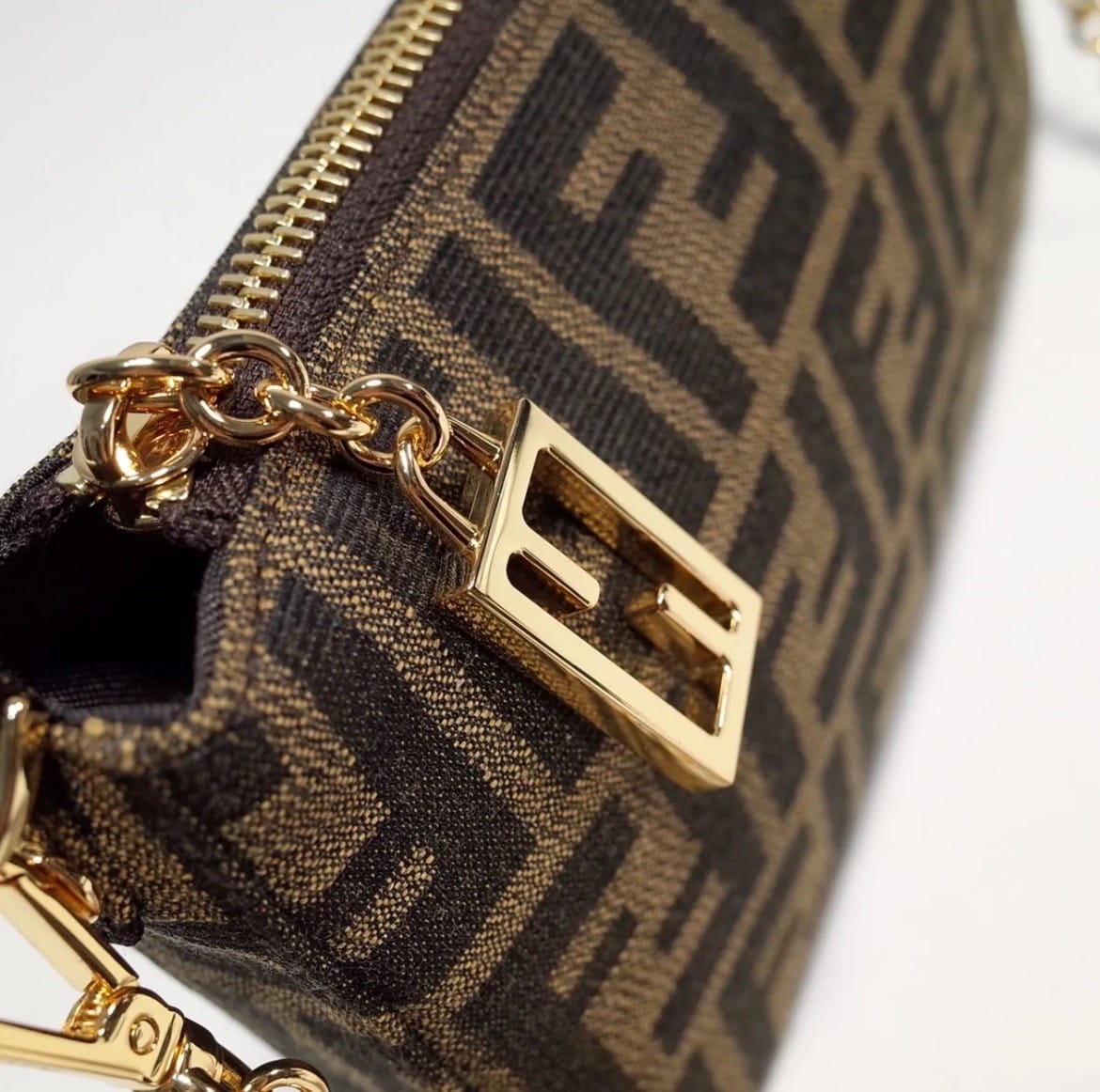 Fendi women's monogram bag close-up with gold-tone hardware
