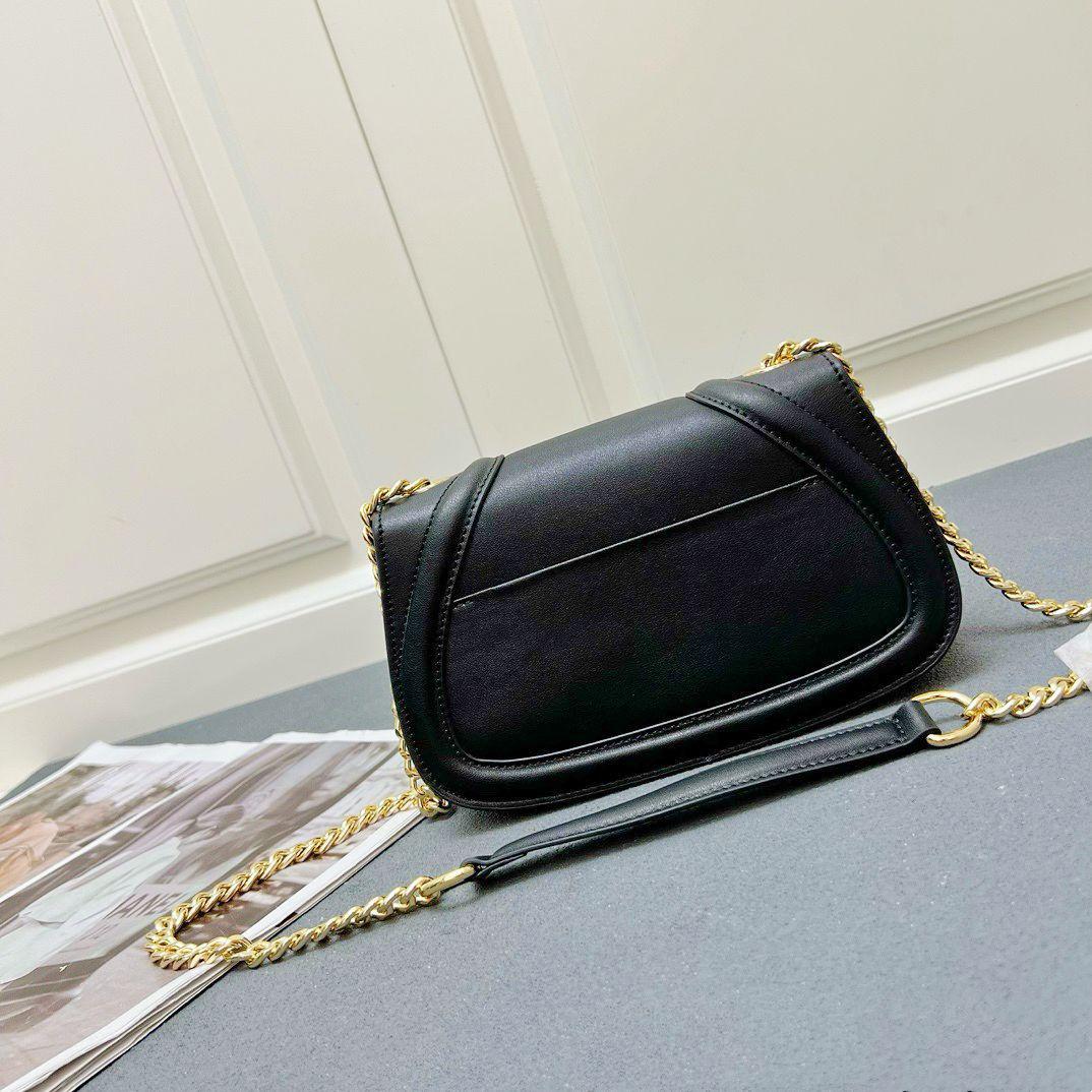 Black Gucci leather crossbody bag with chain and leather shoulder strap
