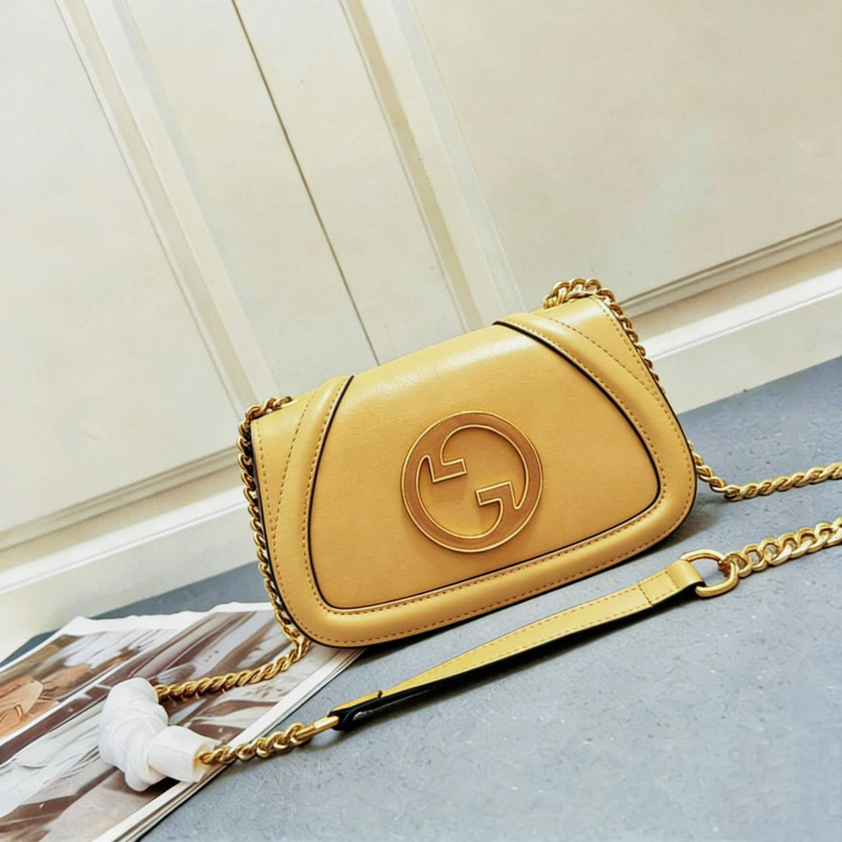 Yellow mustard Gucci leather crossbody bag with gold chain strap
