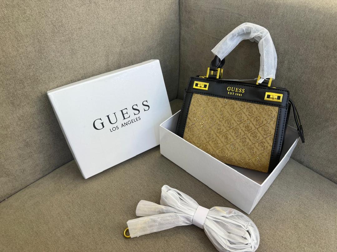 Black Guess women’s mini bag with contrasting details
