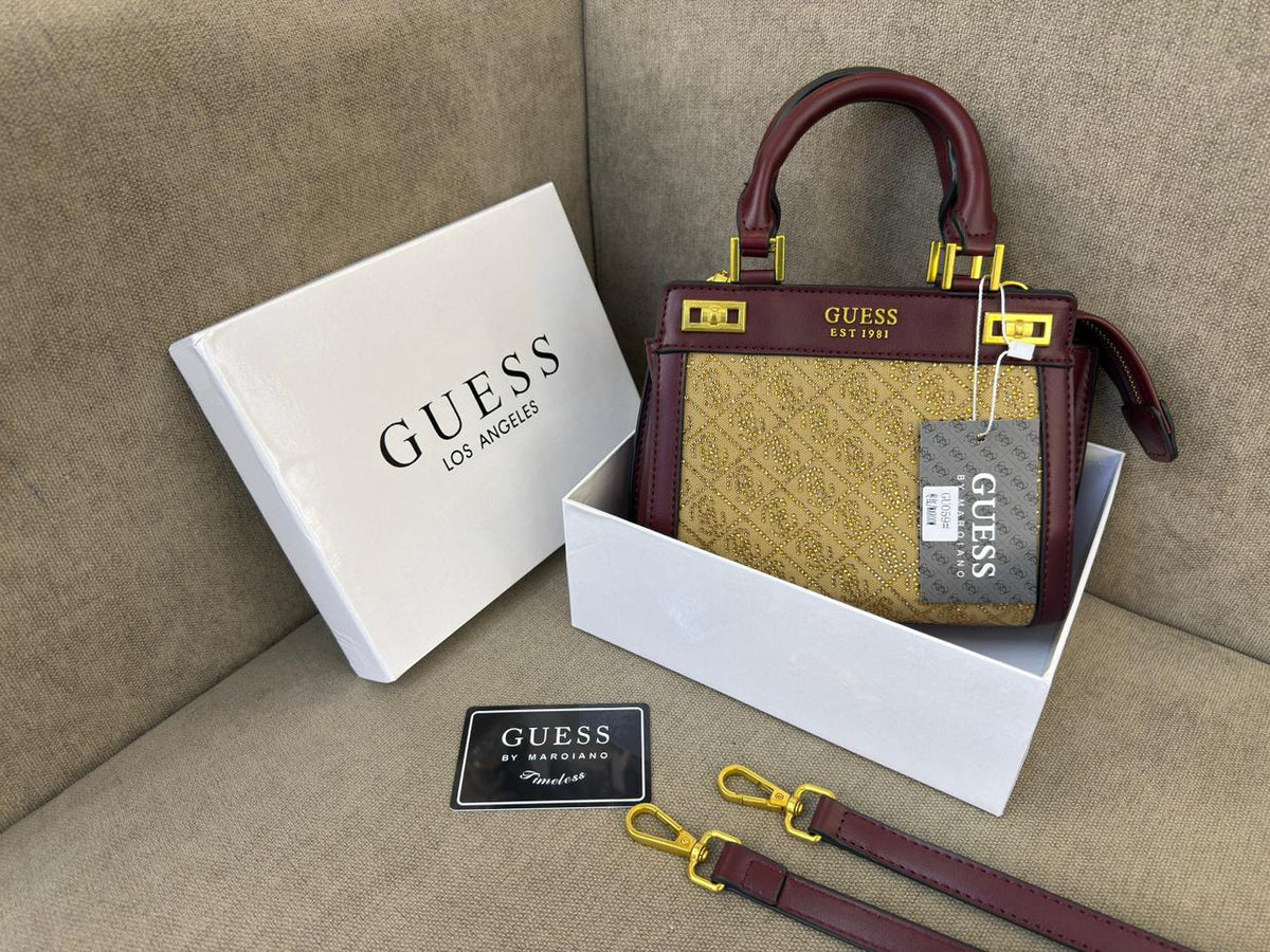 Burgundy Guess women’s mini crossbody bag