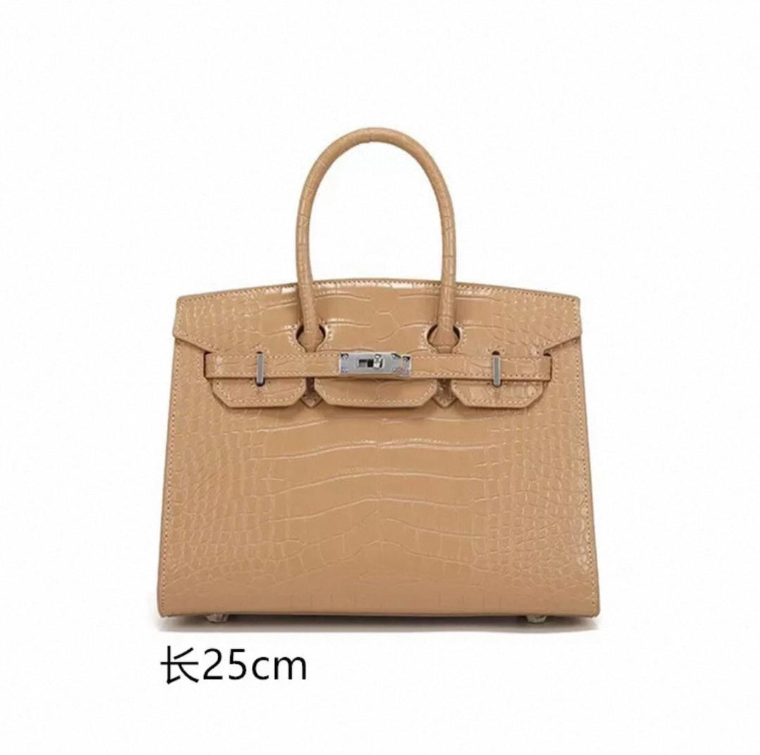 Front view of beige Hermès women’s satchel bag