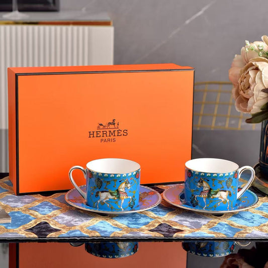 Hermès Cavalier en Formes set of two Blue and Green porcelain mugs with orange box