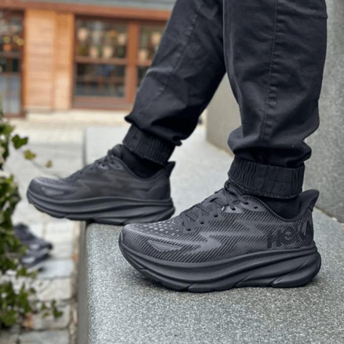 HOKA Bondi 9 black cushioned sneakers on feetv