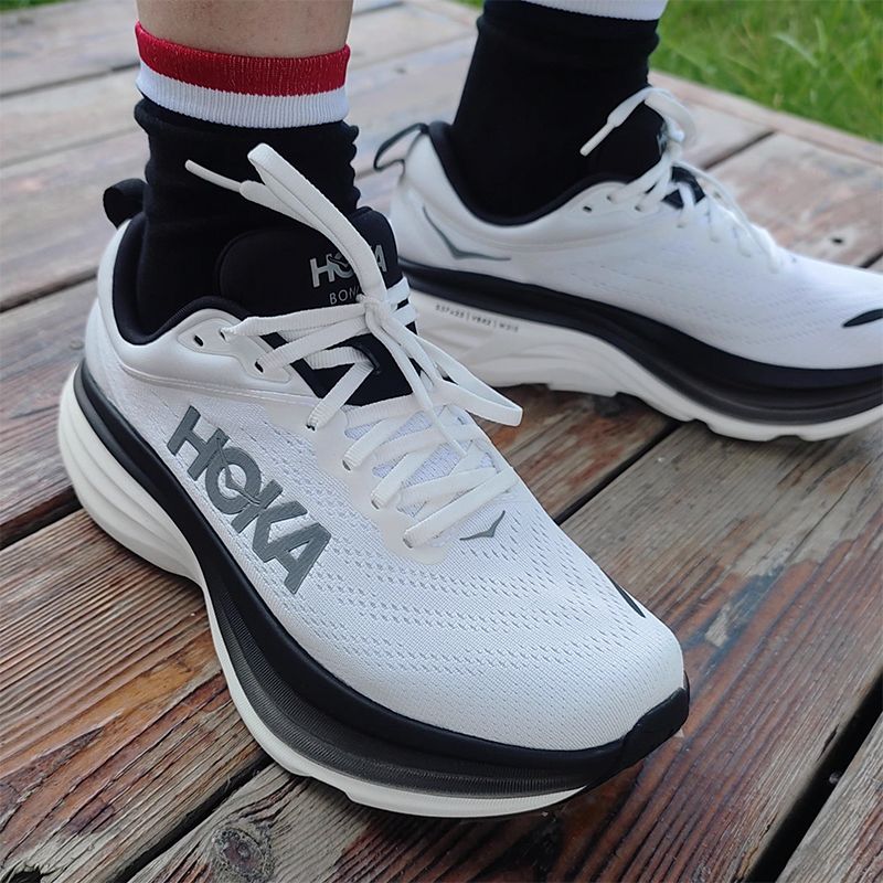White HOKA Bondi 9 running shoes shown on foot