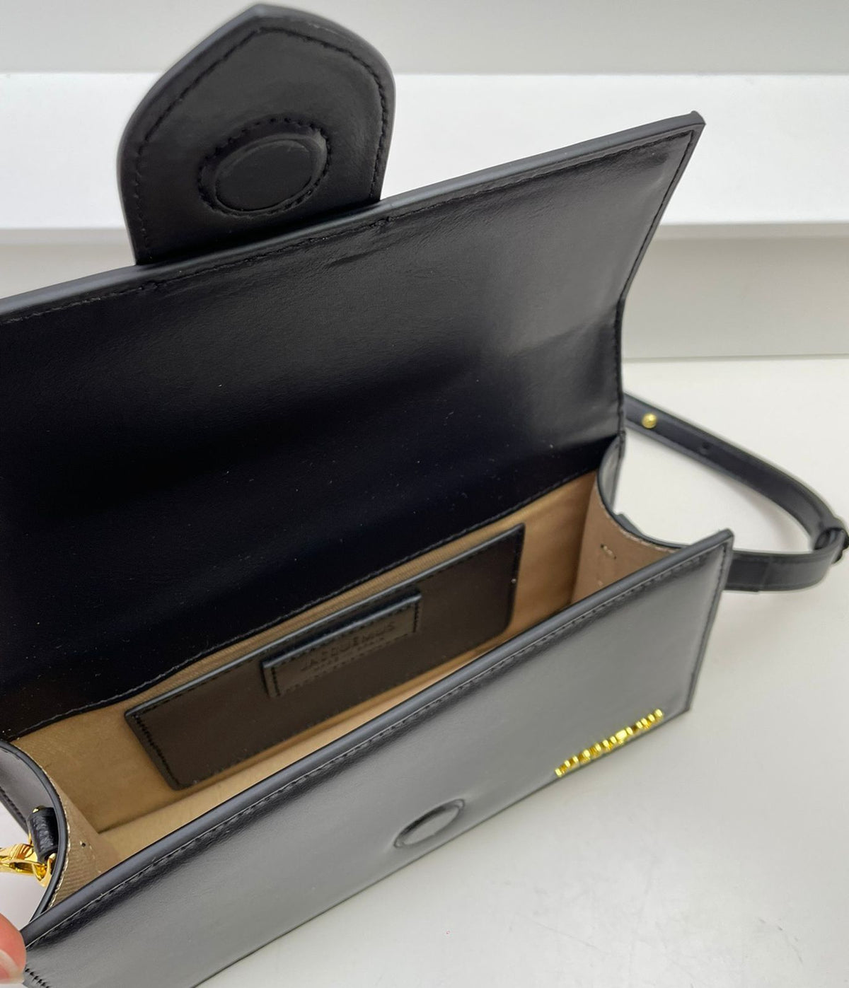 Jacquemus style mini handbag interior storage detail
