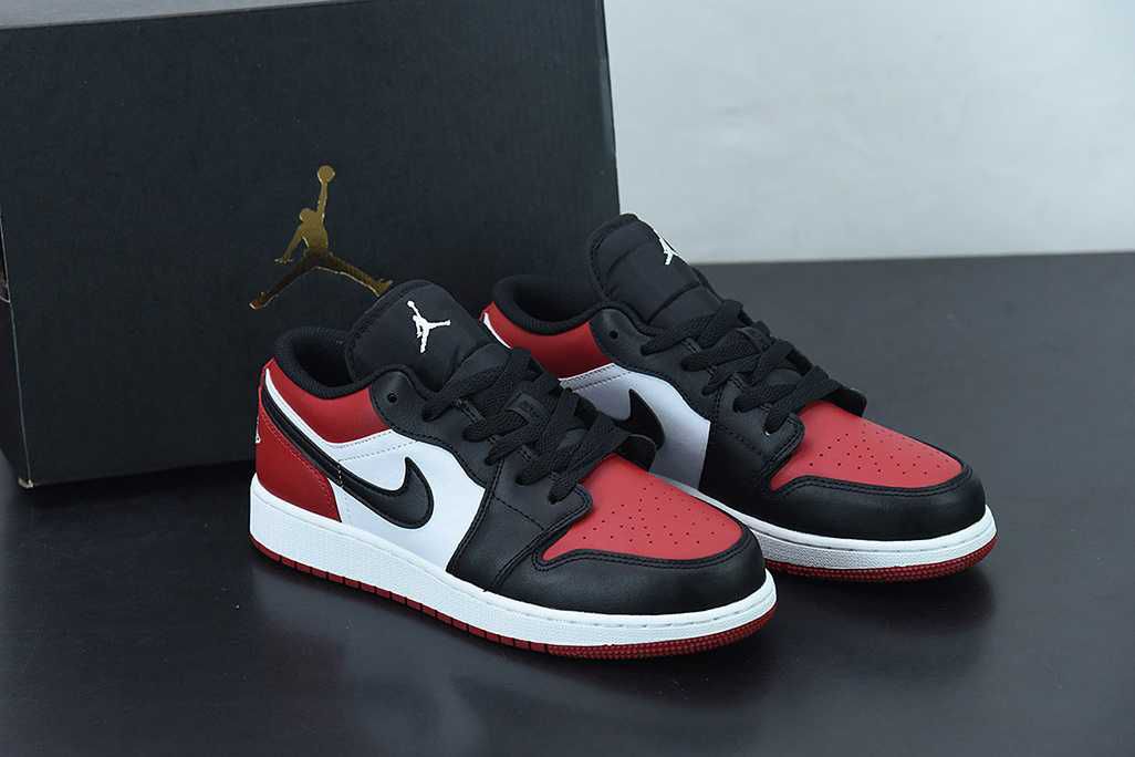 Pair of Air Jordan 1 Low red, black and white sneakers