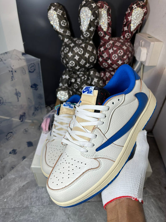 Jordan 1 Low white blue and cream sneakers at Aone Brands Dubai