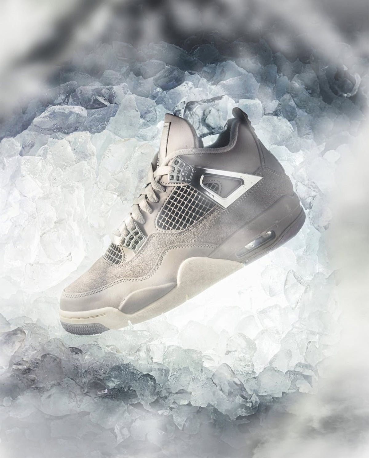 Jordan 4 Frozen Moments in grey with Metallic Silver details