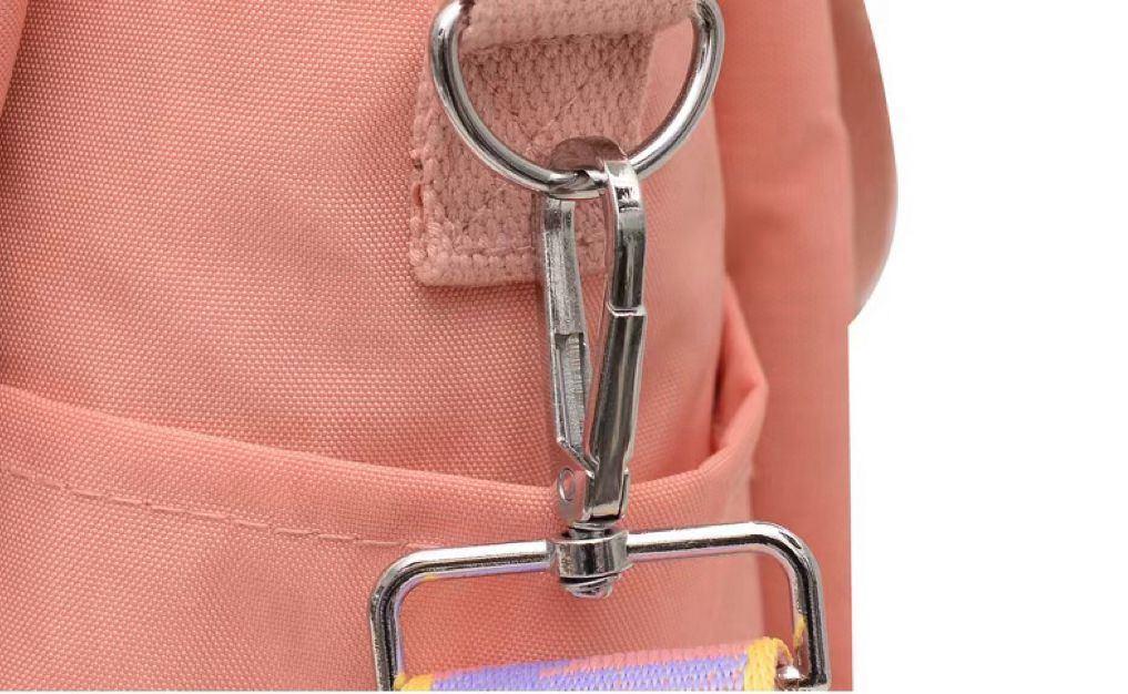 Kipling handbag side strap detail for women