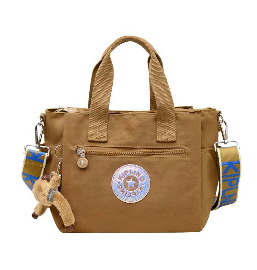 Brown Kipling women's handbag with compact style