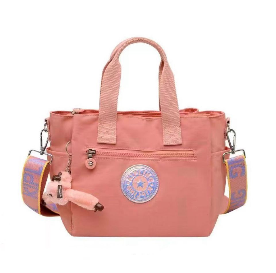 Pink Kipling small handbag for women