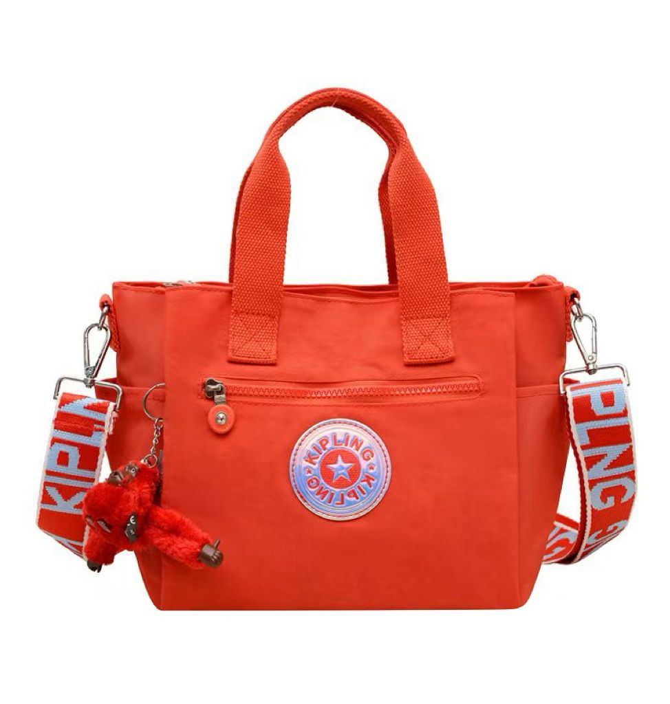 Red Kipling women's carry bag with stylish design