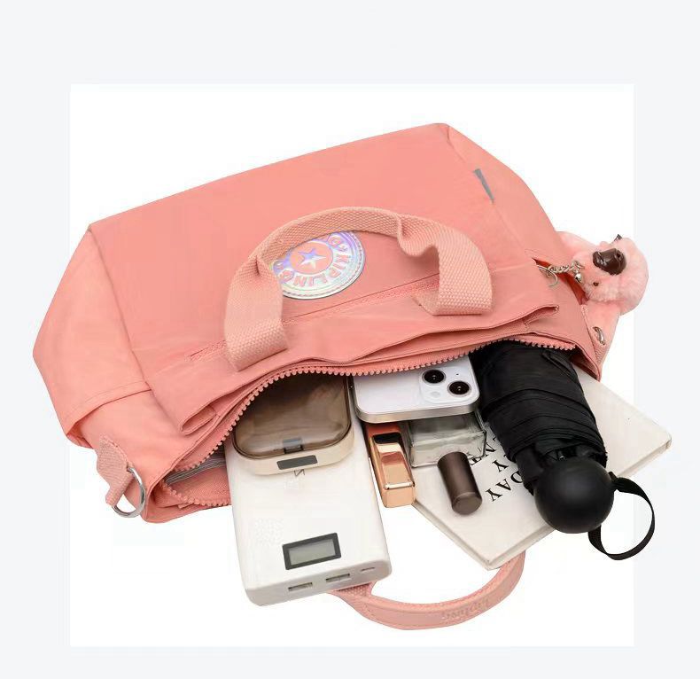Kipling women's handbag front view with top handles