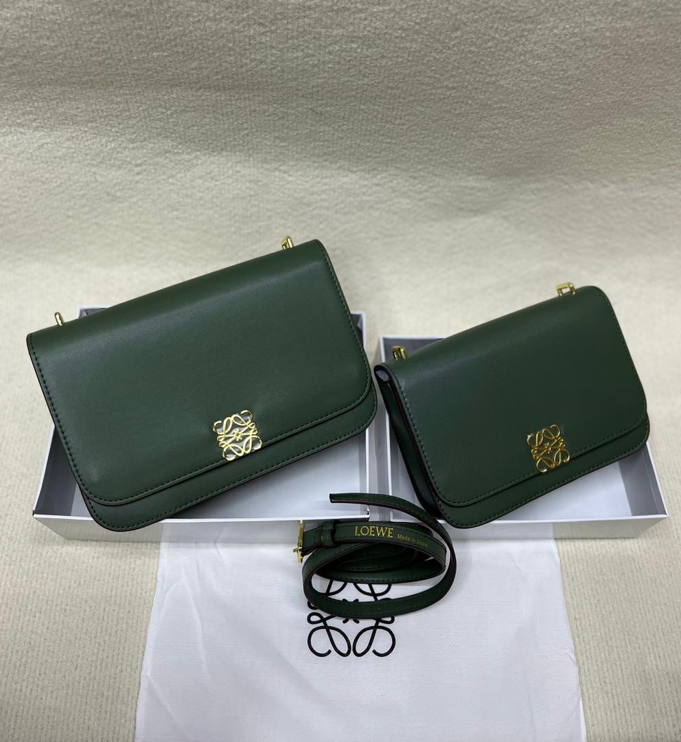 Green Loewe handbags with structured flap design