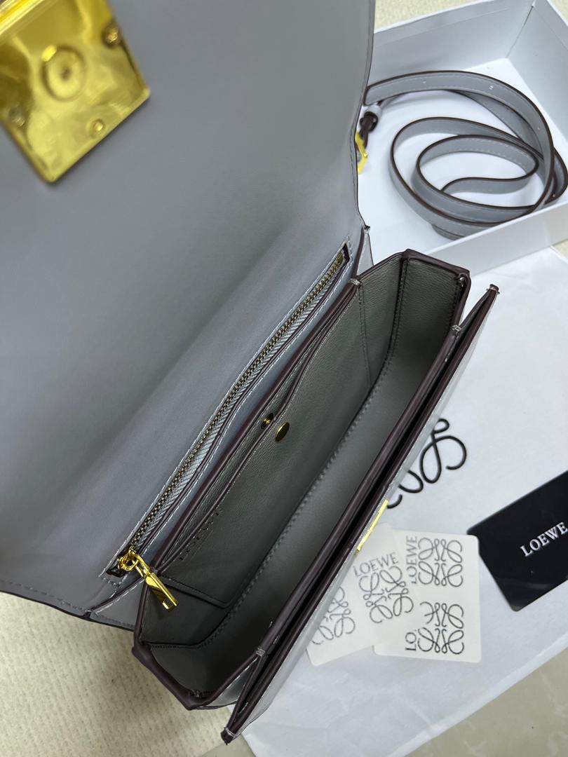 Loewe women's handbag interior with zipper compartment and shoulder strap