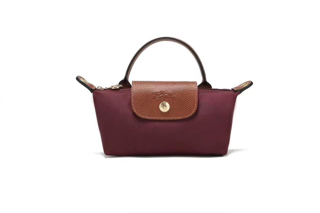 Burgundy Longchamp women’s mini crossbody bag