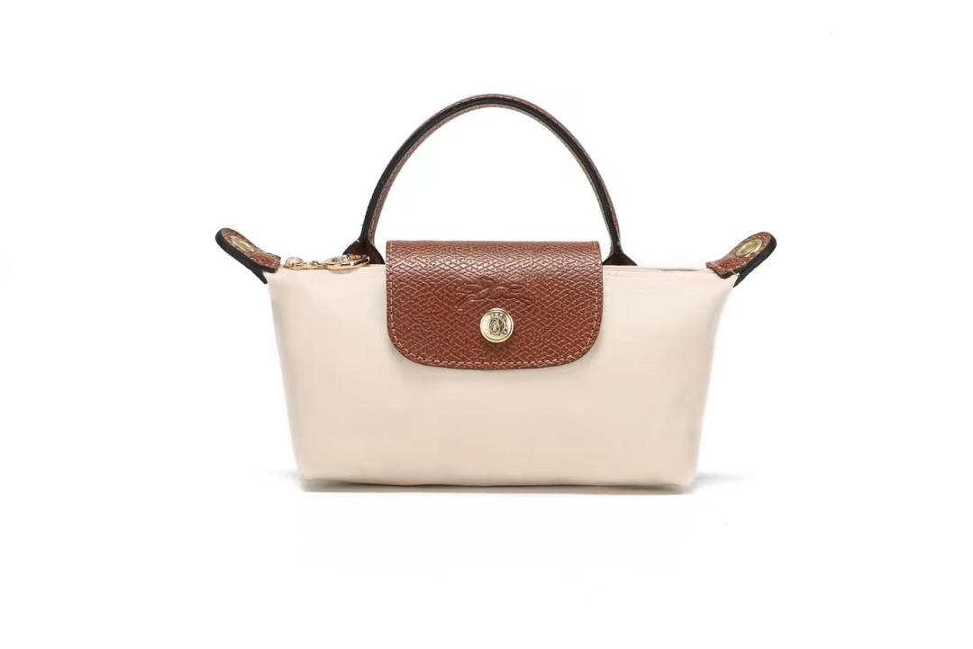 Cream Longchamp mini bag with brown handles