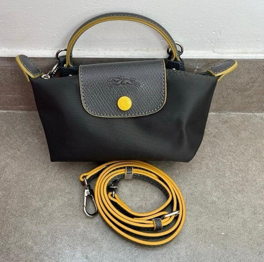 Grey Longchamp mini bag with detachable shoulder strap