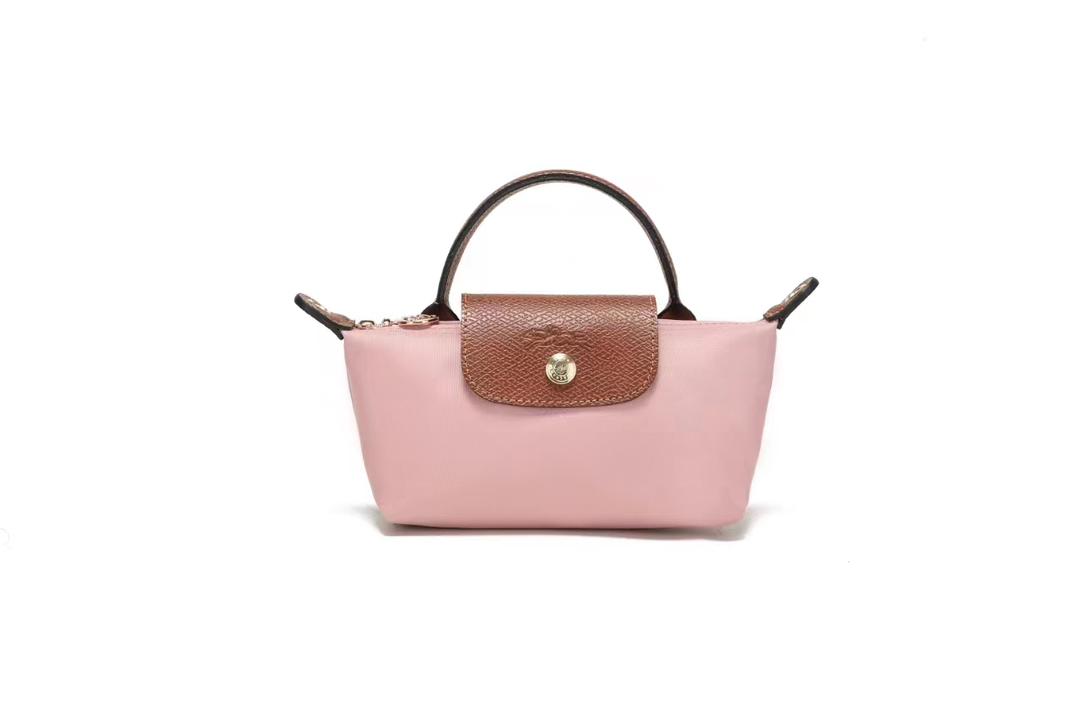 Pink Longchamp mini crossbody bag with brown flap