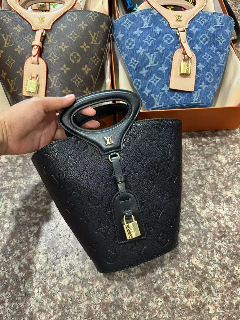 Black Louis Vuitton mini crossbody bag with shoulder strap