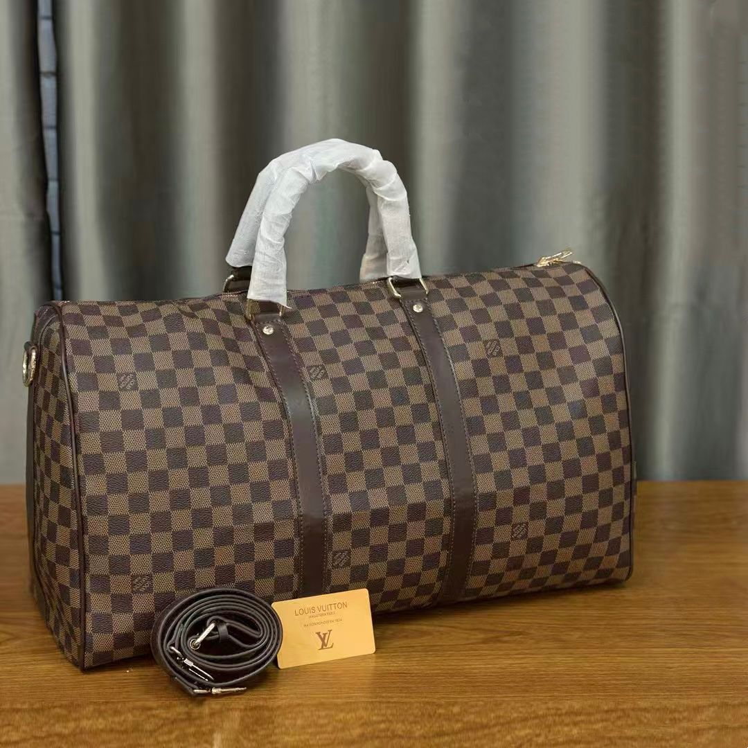 Brown Louis Vuitton monogram style travel bag for women