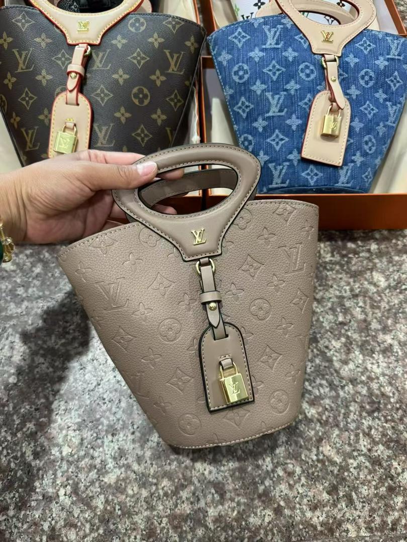 Grey Louis Vuitton mini bag with cut-out top handle